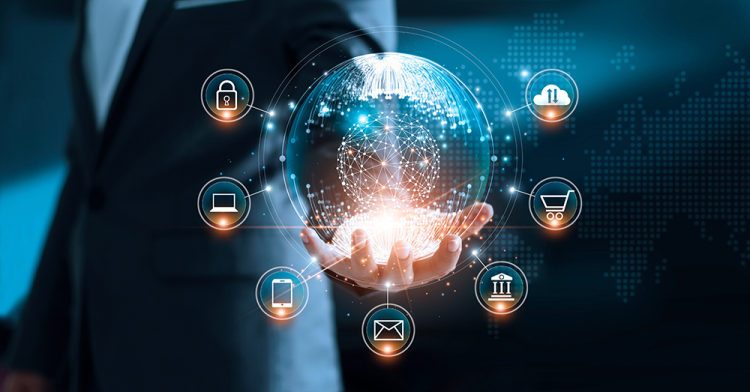 Businessperson holding a glowing digital globe with connected data nodes, surrounded by icons for cloud computing, cybersecurity, email, e-commerce, and digital infrastructure, symbolizing a unified knowledgebase and modern information systems.